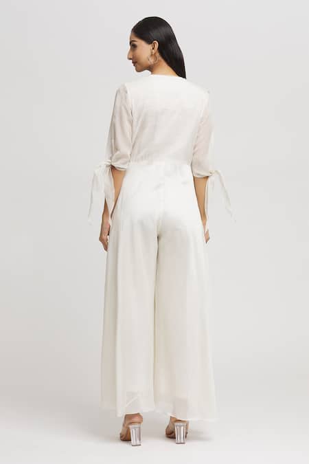 Shop_Whimsical By Shica_Ivory Cotton, Silk Embroidery V-neck Draped Jumpsuit _at_Aza_Fashions