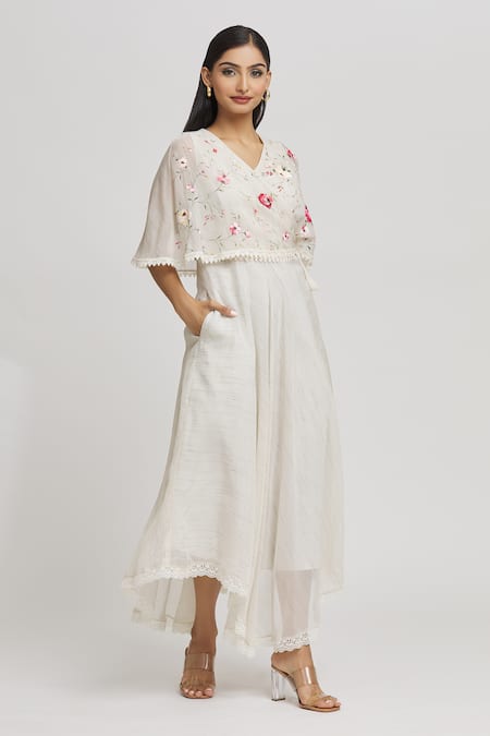 Whimsical By Shica Ivory Cotton, Silk Embroidery V-neck Floral Hand Painted Cape Dress Online at Aza Fashions Whimsical By Shica_Ivory Cotton, Silk Embroidery V-neck Floral Hand Painted Cape Dress _Online_at_Aza_Fashions