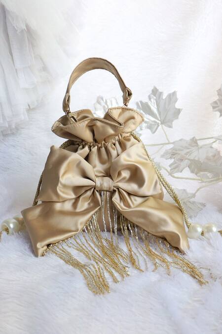 Buy_Soho Boho Studio By Aarti Thakur_Gold Tassels, Bows Cutbead Potli Bag _Online_at_Aza_Fashions