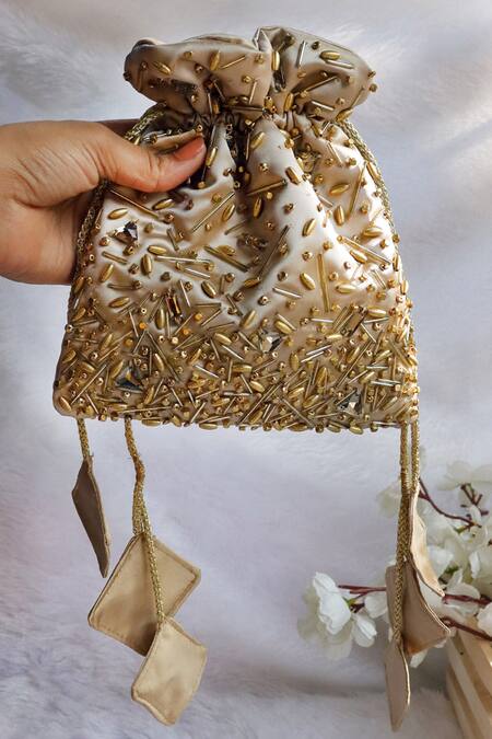 Shop Soho Boho Studio By Aarti Thakur Gold Cut Work, Embroidery Cutdana Embellished Potli Online at Aza Fashions Shop_Soho Boho Studio By Aarti Thakur_Gold Cut Work, Embroidery Cutdana Embellished Potli _Online_at_Aza_Fashions