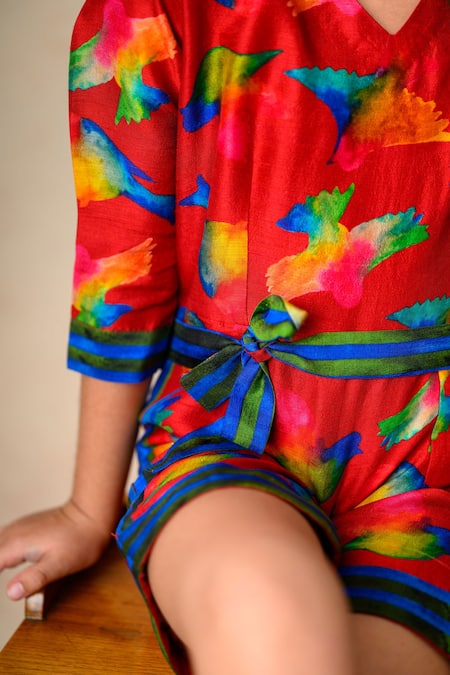 Thetaa_Red Silk Avifauna Print Short Jumpsuit With Striped Belt _at_Aza_Fashions