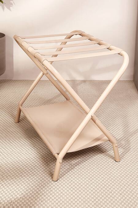 Shop Mason Home Beige Aluminium Modena Foldable Luggage Rack at Aza Fashions Shop_Mason Home_Beige Aluminium Modena Foldable Luggage Rack_at_Aza_Fashions