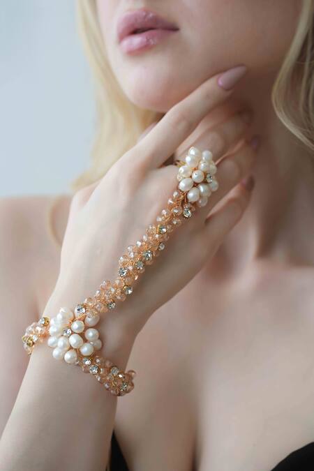 Buy Floristaa By Mahek Peach Crystals, Pearls Gretel Embellished Bracelet Online at Aza Fashions Buy_Floristaa By Mahek_Peach Crystals, Pearls Gretel Embellished Bracelet _Online_at_Aza_Fashions