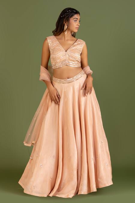 Krina Patel_Peach Net, Linen, Satin, Tissue Matrix Pattern Embellished Blouse Lehenga Set_Online_at_Aza_Fashions