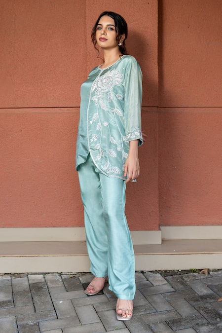 Shop Label Lila Blue Chiffon Beads, Pansy Blossom Embroidered Curved Hem Slit Kurta With Pant Online at Aza Fashions Shop_Label Lila_Blue Chiffon Beads, Pansy Blossom Embroidered Curved Hem Slit Kurta With Pant _Online_at_Aza_Fashions