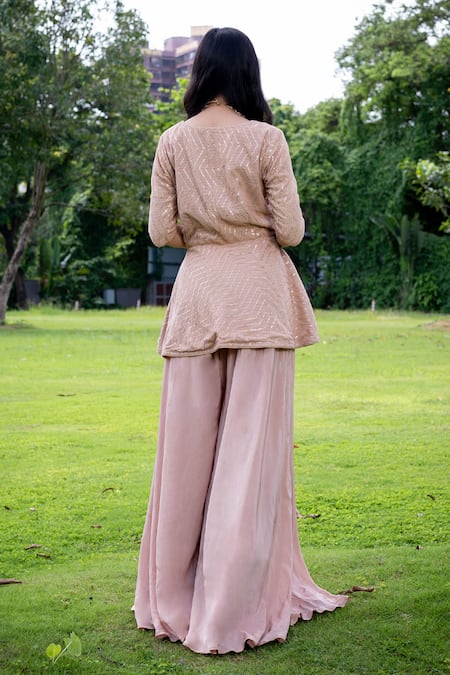 Shop Label Lila Pink Crepe Embroidery, Sequins V-neck Chevron Flame Peplum Kurta With Gharara at Aza Fashions Shop_Label Lila_Pink Crepe Embroidery, Sequins V-neck Chevron Flame Peplum Kurta With Gharara _at_Aza_Fashions