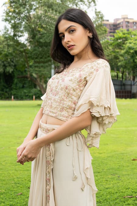 Label Lila_Beige Georgette Embroidery V-neck Wildflora Crop Top Draped Skirt Set _at_Aza_Fashions