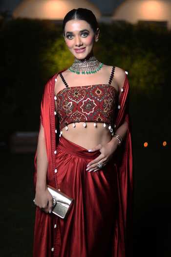 Nitya Bajaj_Red Satin Embroidery Lace Cape Open Border Draped Skirt Set _at_Aza_Fashions