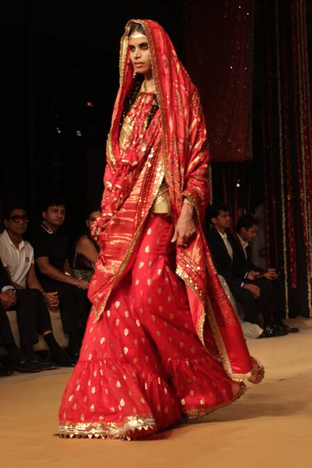 Shop Nitya Bajaj Gold Tissue, Modal, Silk Tassels, Sequins Keyhole Gota Work Shirt Gharara Set at Aza Fashions Shop_Nitya Bajaj_Gold Tissue, Modal, Silk Tassels, Sequins Keyhole Gota Work Shirt Gharara Set_at_Aza_Fashions