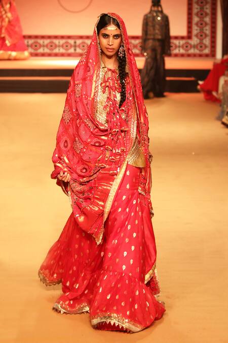 Shop Nitya Bajaj Gold Tissue, Modal, Silk Tassels, Sequins Keyhole Gota Work Shirt Gharara Set Online at Aza Fashions Shop_Nitya Bajaj_Gold Tissue, Modal, Silk Tassels, Sequins Keyhole Gota Work Shirt Gharara Set_Online_at_Aza_Fashions