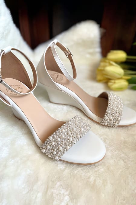 Modanta Footwear White Pearls Embellished Strap Wedges Online at Aza Fashions Modanta Footwear_White Pearls Embellished Strap Wedges _Online_at_Aza_Fashions