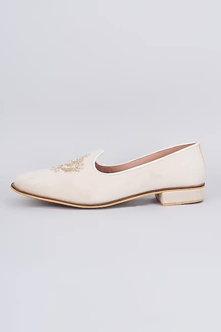 Shop_Rng Safawala_White Royal Crest Embroidered Juttis _at_Aza_Fashions