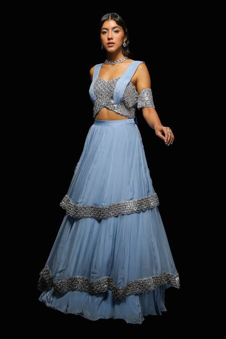 Jade By Ashima_Blue Silk, Selenia Nalki Encrusted Cold Shoulder Crop Top With Layered Lehenga _Online_at_Aza_Fashions