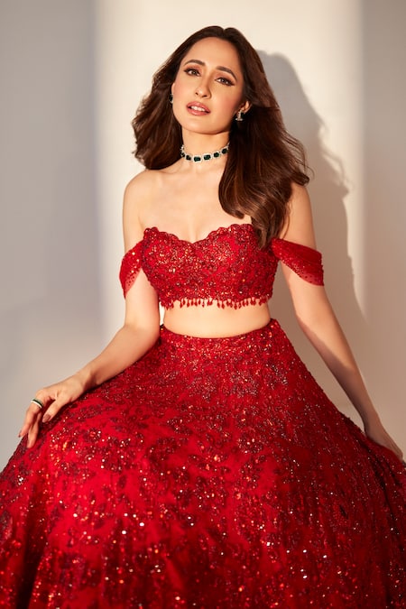 Seema Gujral_Red Net Sequins, Crystals Off-shoulder Embroidered Blouse Lehenga Set_at_Aza_Fashions