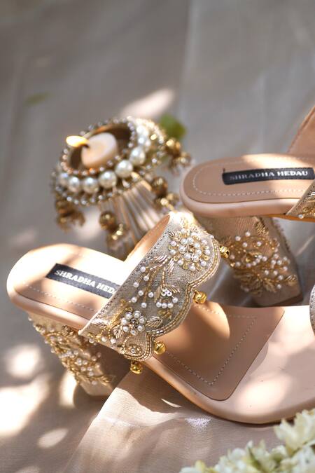 Buy Shradha Hedau Footwear Couture Beige Gota Patti, Embroidery Hazel Ghungroo Embellished Kolhapuri Block Heels Online at Aza Fashions Buy_Shradha Hedau Footwear Couture_Beige Gota Patti, Embroidery Hazel Ghungroo Embellished Kolhapuri Block Heels _Online_at_Aza_Fashions