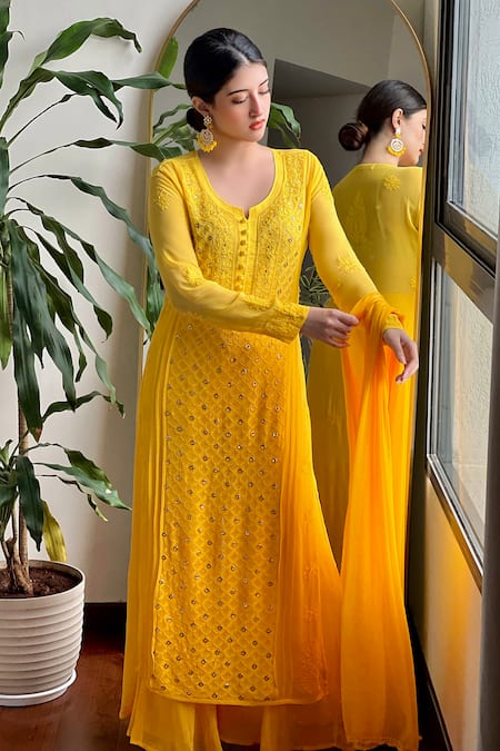 LABEL AISHWARYRIKA Yellow Georgette Hand Embroidered Chikankari Thread Firefly Kurta Palazzo Set 