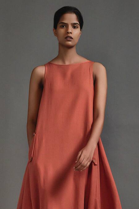 MATI_1_Orange Cotton Boat Neck Asymmetric Cowl Dress _Online_at_Aza_Fashions