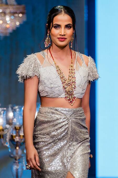 Rina Dhaka Silver Net Gota Patti, Helix Fringe Sleeves Blouse With Cosmo Embellished Skirt Online at Aza Fashions Rina Dhaka_Silver Net Gota Patti, Helix Fringe Sleeves Blouse With Cosmo Embellished Skirt _Online_at_Aza_Fashions