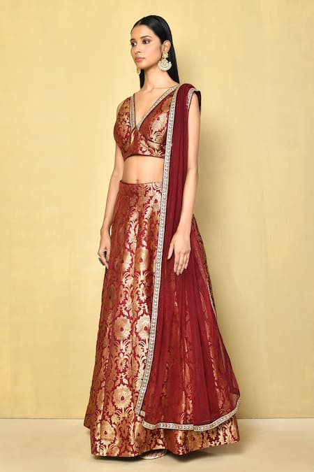 Naintara Bajaj_Wine Brocade, Chiffon Sequins, Lace, Floral Pattern Blouse Lehenga Set _at_Aza_Fashions