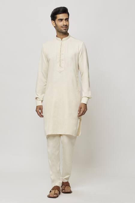 Buy Samyukta Singhania Cream Silk Embroidery Thread Work Placket Kurta Online at Aza Fashions Buy_Samyukta Singhania_Cream Silk Embroidery Thread Work Placket Kurta_Online_at_Aza_Fashions