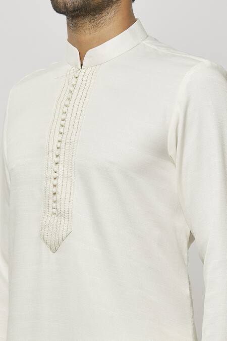 Shop Samyukta Singhania Cream Silk Embroidery Thread Placket Kurta Online at Aza Fashions Shop_Samyukta Singhania_Cream Silk Embroidery Thread Placket Kurta_Online_at_Aza_Fashions