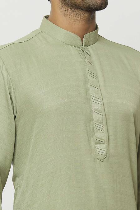 Shop Samyukta Singhania Green Silk Pintucked Bordered Solid Kurta Online at Aza Fashions Shop_Samyukta Singhania_Green Silk Pintucked Bordered Solid Kurta_Online_at_Aza_Fashions