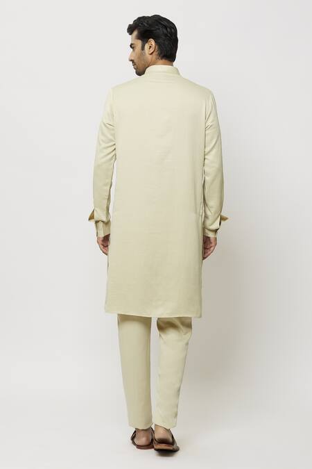 Shop Samyukta Singhania Beige Silk Pintucked Bordered Plain Kurta at Aza Fashions Shop_Samyukta Singhania_Beige Silk Pintucked Bordered Plain Kurta_at_Aza_Fashions