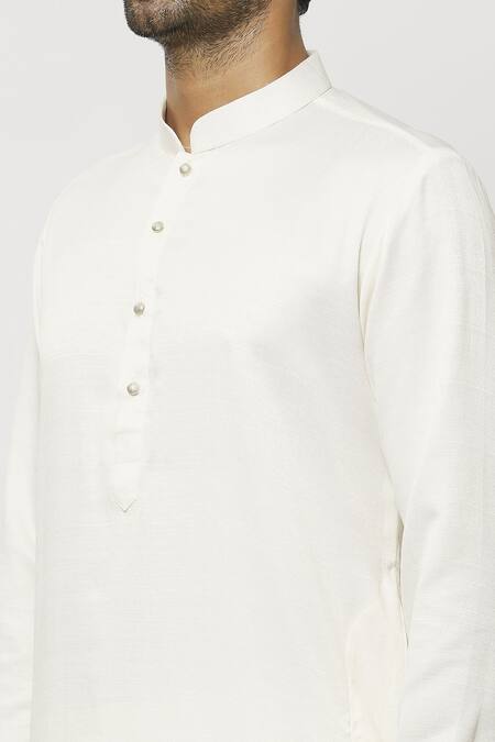 Shop Samyukta Singhania Cream Silk Pintucked Bordered Straight Kurta Online at Aza Fashions Shop_Samyukta Singhania_Cream Silk Pintucked Bordered Straight Kurta_Online_at_Aza_Fashions