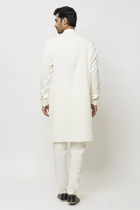 Shop Samyukta Singhania Cream Silk Pintucked Bordered Straight Kurta at Aza Fashions Shop_Samyukta Singhania_Cream Silk Pintucked Bordered Straight Kurta_at_Aza_Fashions