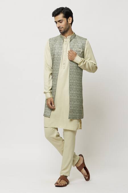 Silk Fabric Cream Kurta Pyjama With Engaging Golden Color Jacket In  Function Wear