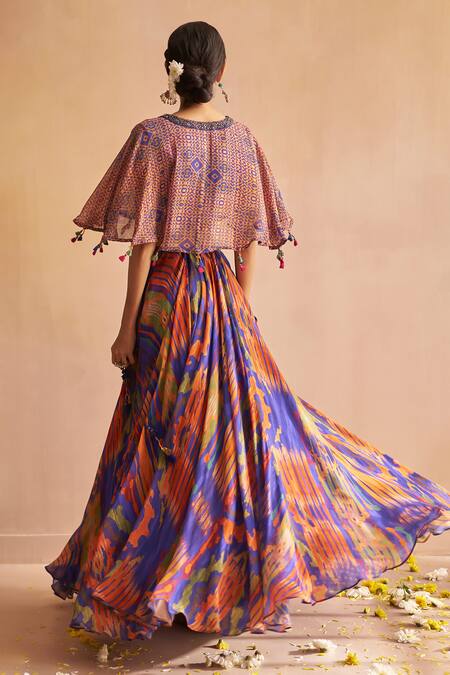 Shop Saundh Blue Georgette Tassels V-neck Aria Geometric Print Lehenga And Cape Blouse Set at Aza Fashions Shop_Saundh_Blue Georgette Tassels V-neck Aria Geometric Print Lehenga And Cape Blouse Set_at_Aza_Fashions