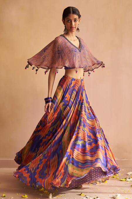 Saundh Blue Georgette Tassels V-neck Aria Geometric Print Lehenga And Cape Blouse Set at Aza Fashions Saundh_Blue Georgette Tassels V-neck Aria Geometric Print Lehenga And Cape Blouse Set_at_Aza_Fashions