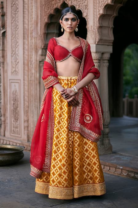Day Wedding Lehenga Style | Vermillion red lehenga with yellow ochre, gold  and silver accents and
