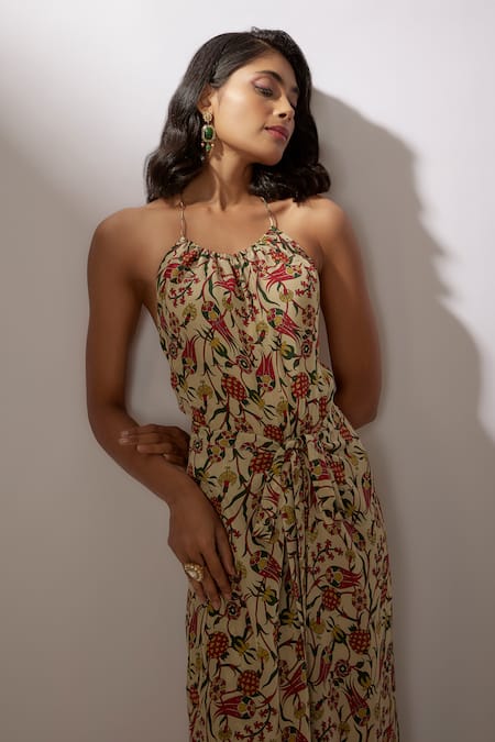 Buy_Nadima Saqib_Beige Crepe Tassels Halter Neck Printed Tie-up Jumpuit _Online_at_Aza_Fashions