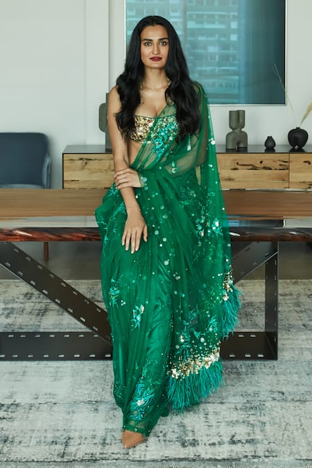 Shop_Dilnaz_Emerald Green Net, Polyester Feathers, Sequins Applique Embellished Saree _at_Aza_Fashions