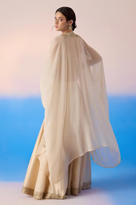Shop Mirroir Beige Silk, Chanderi, Viscose Sequins, Thread Embroidered Cape Sharara Set at Aza Fashions Shop_Mirroir_Beige Silk, Chanderi, Viscose Sequins, Thread Embroidered Cape Sharara Set _at_Aza_Fashions