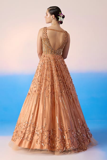 Shop Mirroir Peach Net Embellished Sequin Sweetheart Floral Jaal Gown at Aza Fashions Shop_Mirroir_Peach Net Embellished Sequin Sweetheart Floral Jaal Gown _at_Aza_Fashions