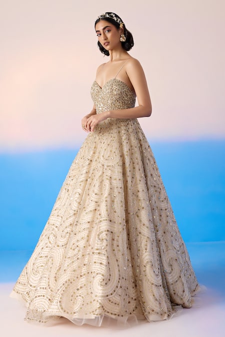 Mirroir Beige Net Embellished Sequin Sweetheart Swirl Crystal Strappy Gown at Aza Fashions Mirroir_Beige Net Embellished Sequin Sweetheart Swirl Crystal Strappy Gown _at_Aza_Fashions