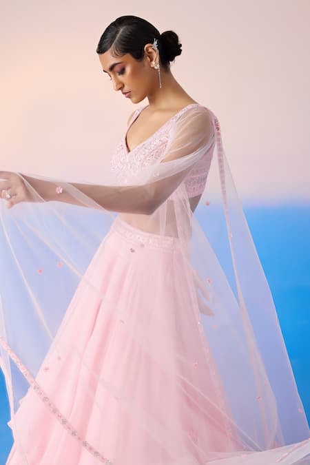Mirroir Pink Net, Viscose Sequins, Floral Embellished Blouse Tiered Lehenga Set at Aza Fashions Mirroir_Pink Net, Viscose Sequins, Floral Embellished Blouse Tiered Lehenga Set _at_Aza_Fashions