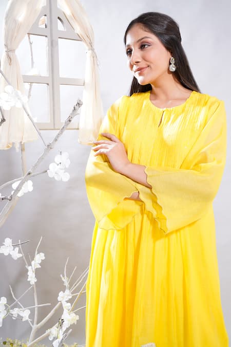 The White Tree Studio_Yellow Kurta- Chanderi (70% Cotton And 30% Silk) Ravina & Leggings Set _at_Aza_Fashions
