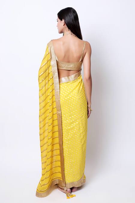 Shop_Nikasha_Yellow Crepe Sweetheart Neck Embroidered Saree With Blouse _at_Aza_Fashions