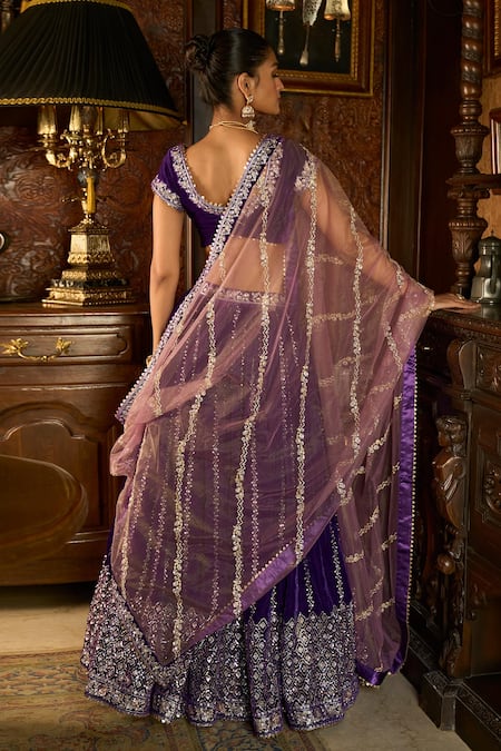 Shop Lashkaraa Purple Velvet, Net Sequins, Stones, Zari Asymmetric Embroidered Lehenga Set at Aza Fashions Shop_Lashkaraa_Purple Velvet, Net Sequins, Stones, Zari Asymmetric Embroidered Lehenga Set_at_Aza_Fashions