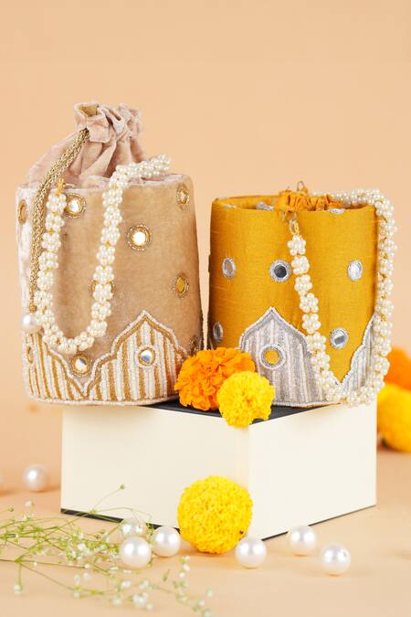 Buy Feza Bags Yellow Applique Mughal Circular Potli Bag Online at Aza Fashions Buy_Feza Bags_Yellow Applique Mughal Circular Potli Bag _Online_at_Aza_Fashions