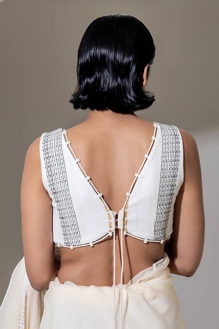 Shop_Kusmi_Ivory 100% Handwoven Cotton Hand Embroidered Beads Deep V Neck Blouse _at_Aza_Fashions