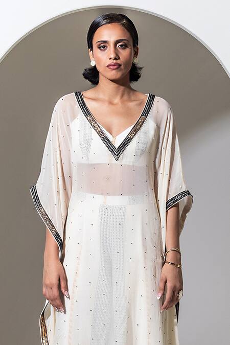 Buy Kusmi Ivory Organza Sequins, Beads Plunge Neck And Embroidered Kaftan Online at Aza Fashions Buy_Kusmi_Ivory Organza Sequins, Beads Plunge Neck And Embroidered Kaftan _Online_at_Aza_Fashions