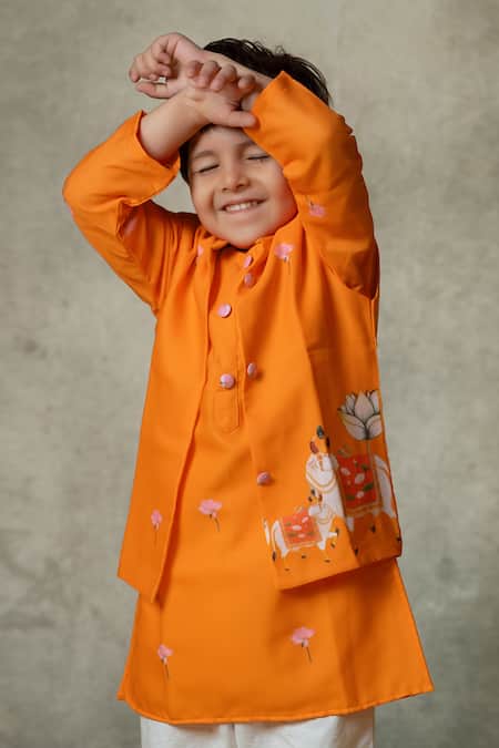 Shop Vivedkids Orange Cotton Embroidery Pichwai Cow Print Kurta Set at Aza Fashions Shop_Vivedkids_Orange Cotton Embroidery Pichwai Cow Print Kurta Set _at_Aza_Fashions