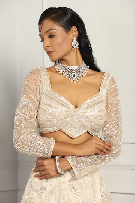 Meenagurnam_Ivory Net Sequins, Cut Work, Beads Floral Embroidered Bridal Lehenga Set _at_Aza_Fashions