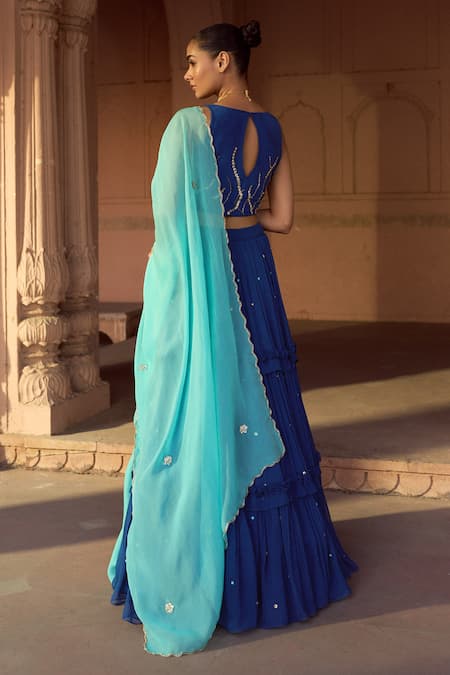 Shop Sonal Pasrija Blue Silk, Organza, Georgette Sequins, Beads V-neck Frill Tiered Lehenga Set at Aza Fashions Shop_Sonal Pasrija_Blue Silk, Organza, Georgette Sequins, Beads V-neck Frill Tiered Lehenga Set _at_Aza_Fashions