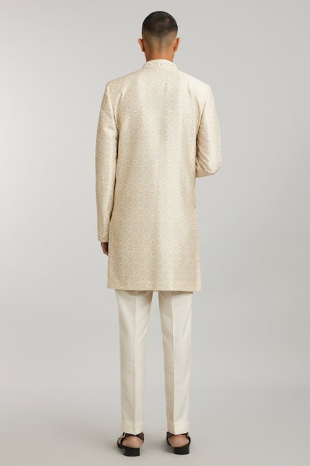 Shop Bubber Couture Off White Silk, Cotton Pearls Angelo Emblem Print Front-open Sherwani at Aza Fashions Shop_Bubber Couture_Off White Silk, Cotton Pearls Angelo Emblem Print Front-open Sherwani _at_Aza_Fashions
