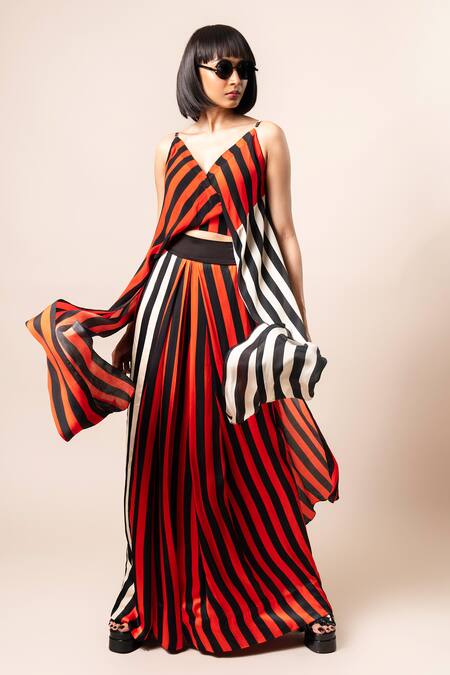 Nupur Kanoi_Orange Crepe, Satin V-neck Printed Draped Top And Lungi Skirt Set_at_Aza_Fashions